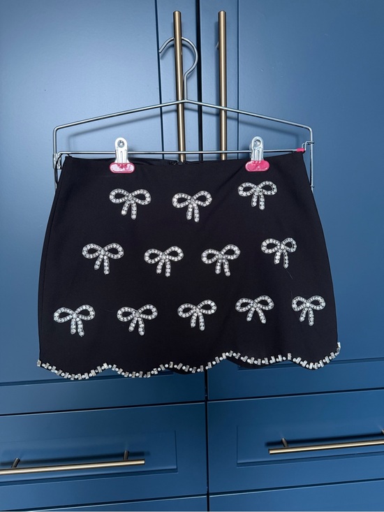 En Saison Dresses & Skirts - En Saison Black Mini Skirt with Crystal Bow Accents